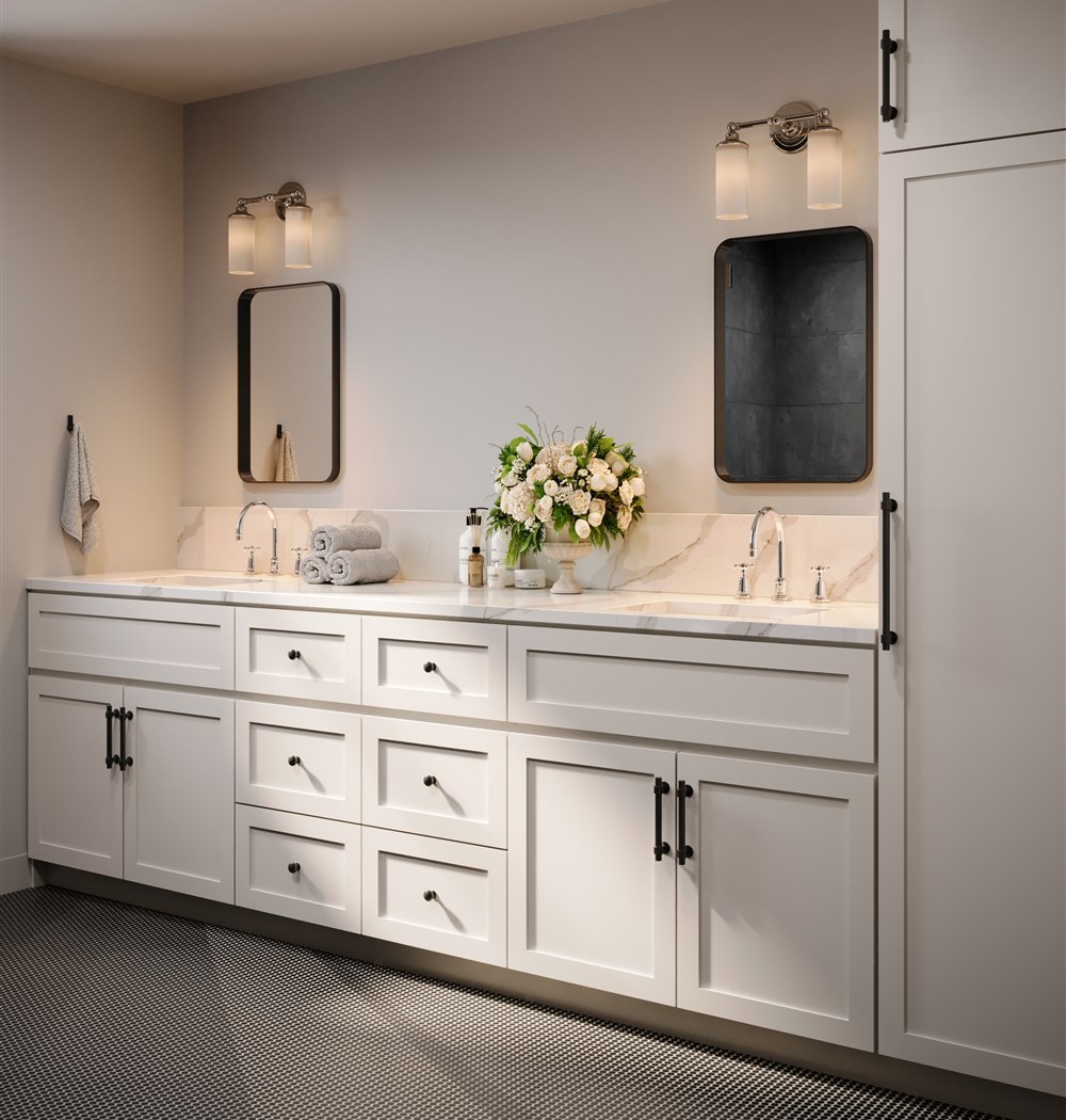 Bathroom with a white double vanity and marble counter