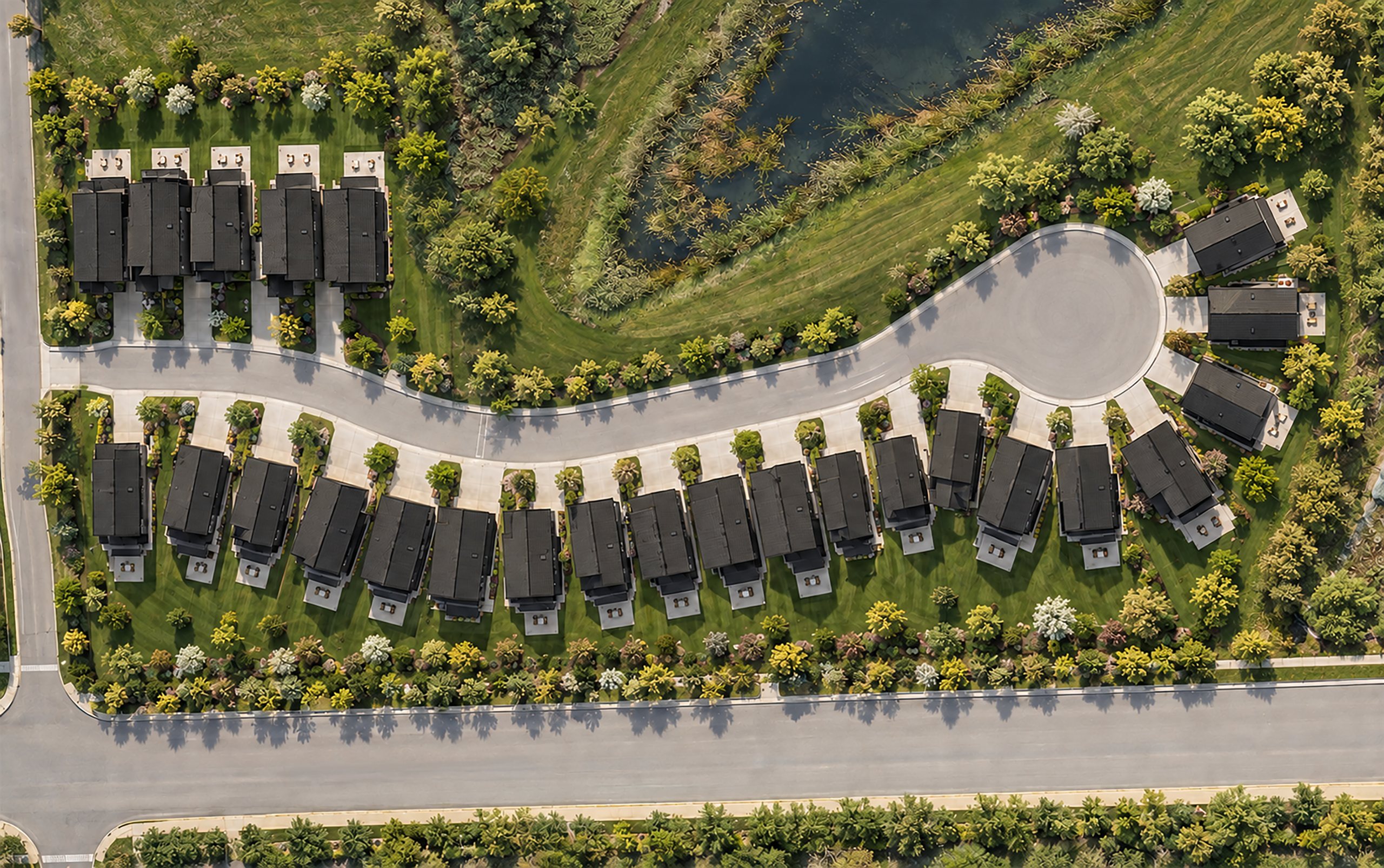 Aerial view of Briarwood Row homes along Yarrow Place at sunset